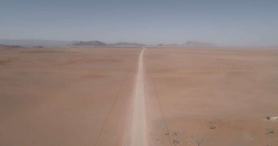 Landscape view of a long dirt road