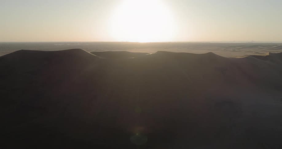 The sun is setting in the horizon