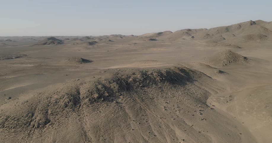 A desolate landscape of dirt and sand
