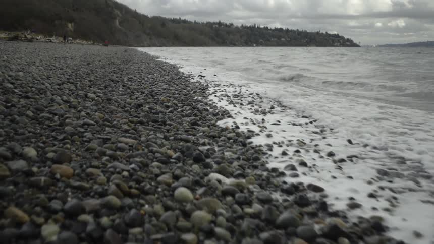 Wavers crashing on rocks