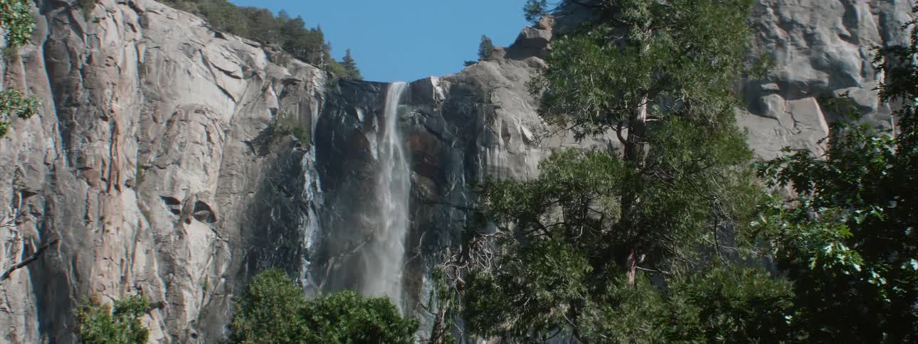 Waterfall flowing from a cliff in the canyon