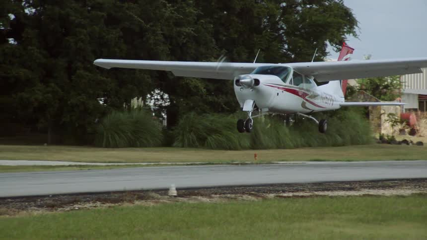 Plane takes off the ground during the day