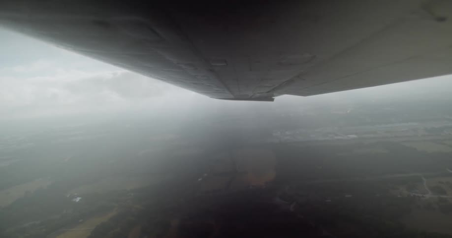 View of the land below an airplane wing