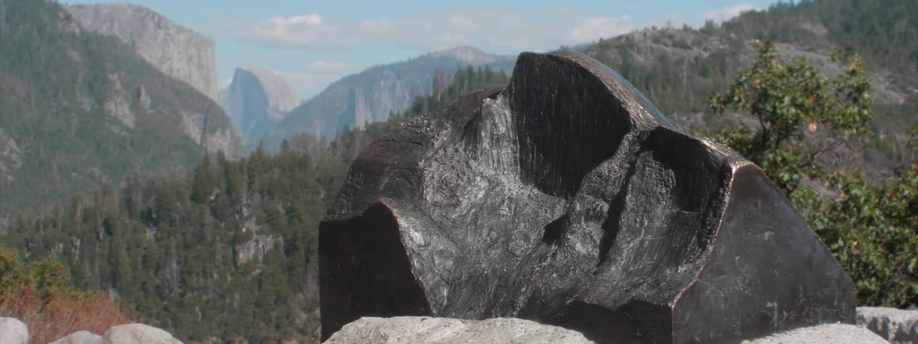 A large block of granite sits outdoors