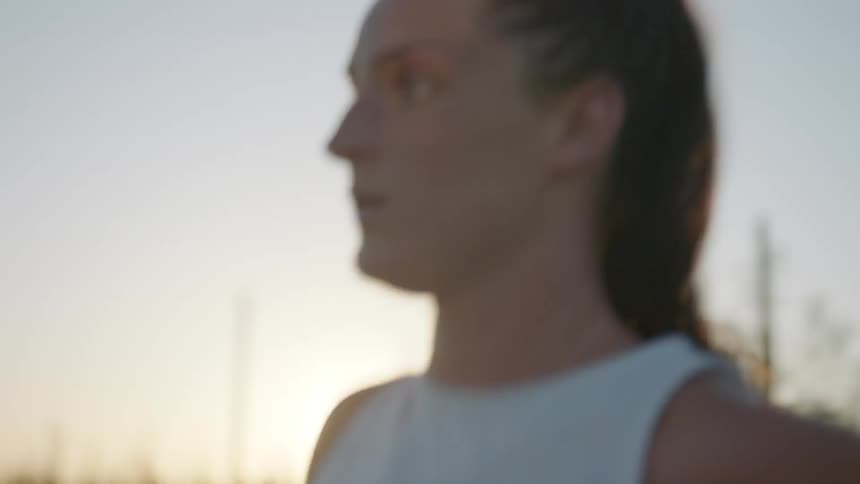 A woman runs near the desert