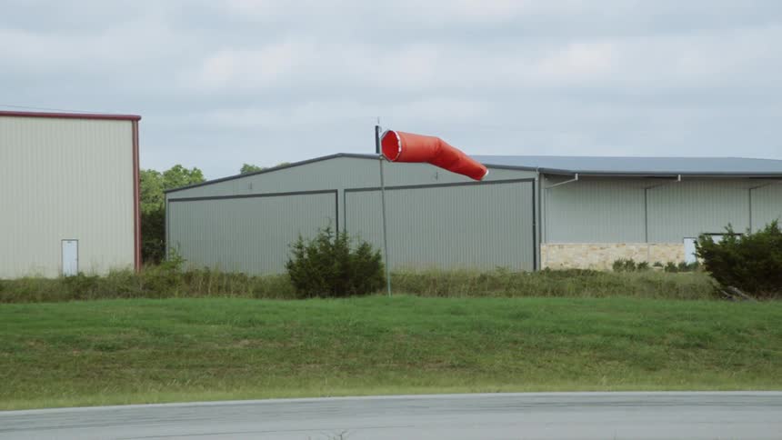 A wind sock moves in the breeze