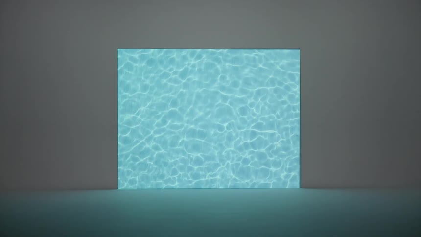 A television displaying the surface of a pool before going dark