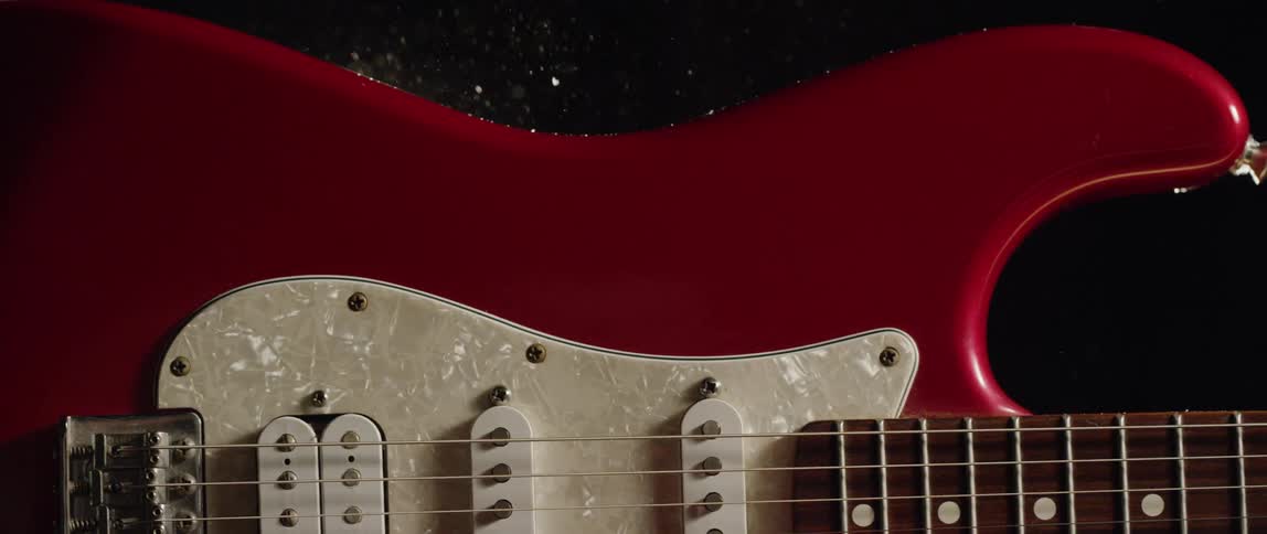 A red stratocaster guitar