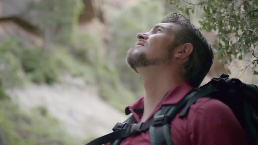 A man is hiking outdoors