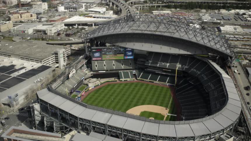 A large empty stadium in the middle of a city