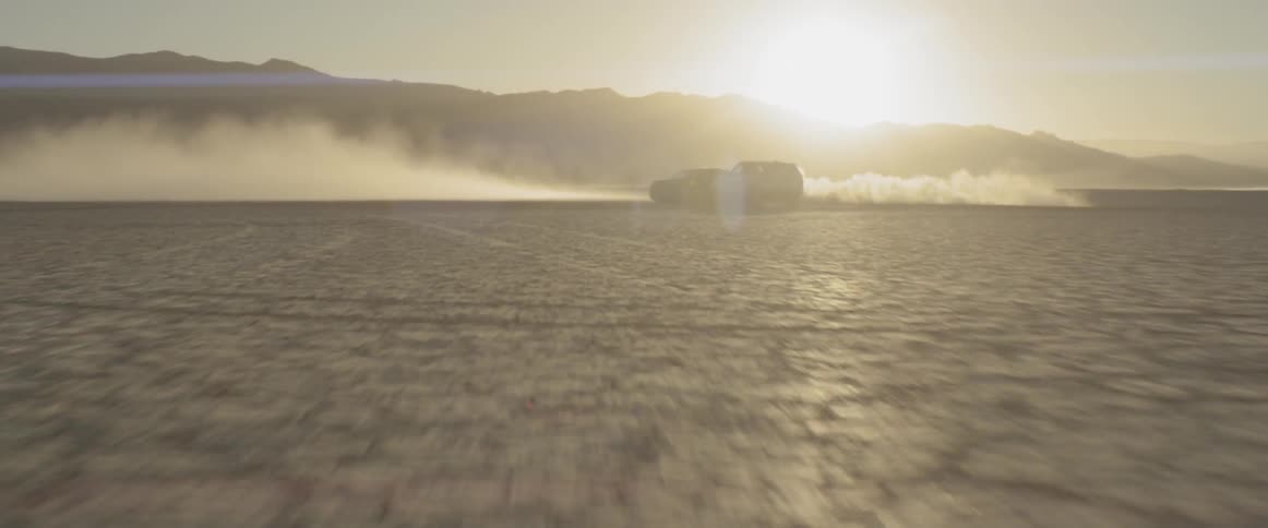 Landscape view of a vehicle speeding around another vehicle