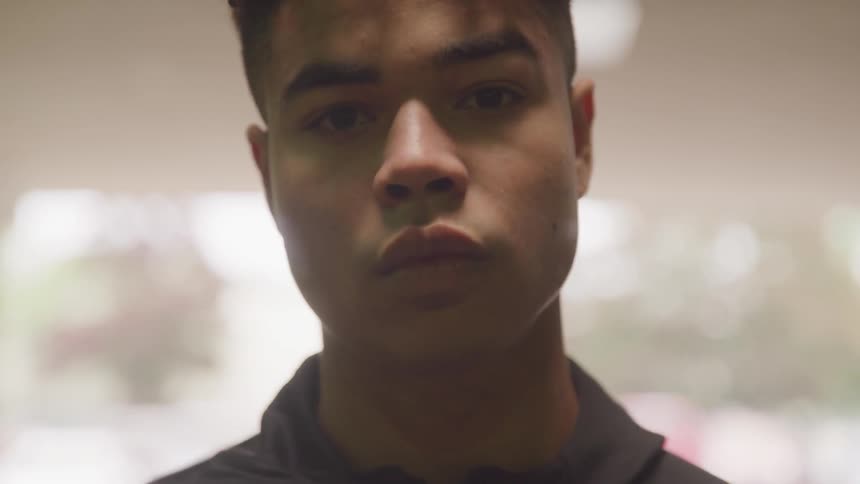 A portrait of a teen male