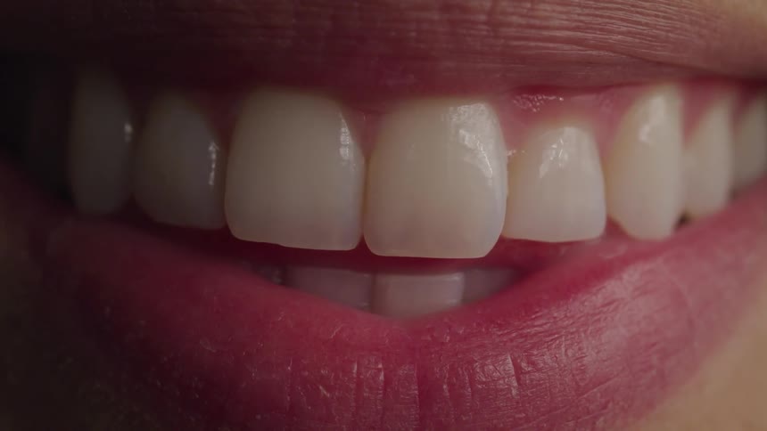 A close up of a persons smile