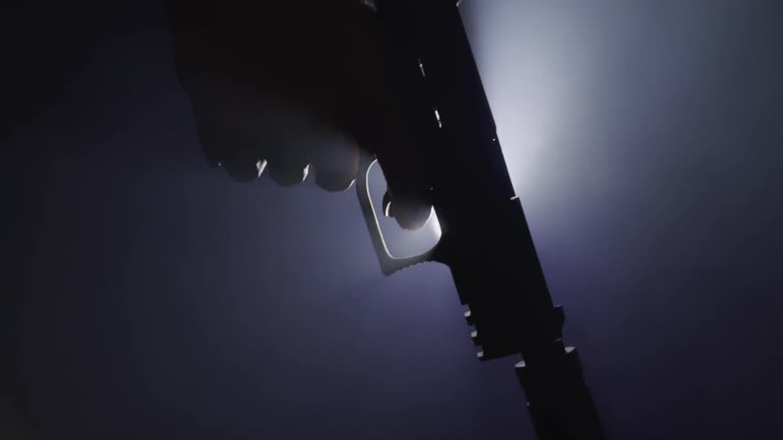 A gun under the shine of light