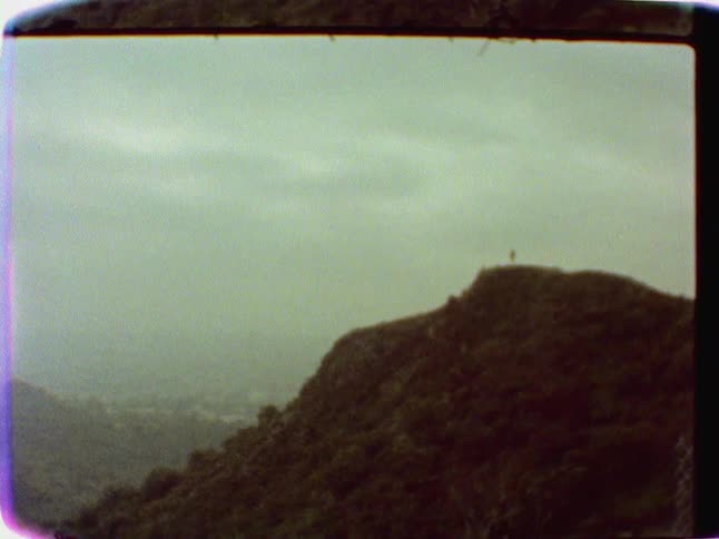 A person standing on a mountain