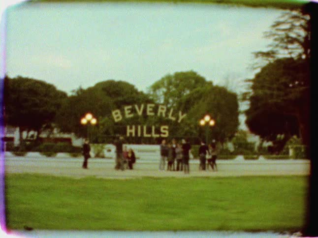 Driving past a beverly hills sign