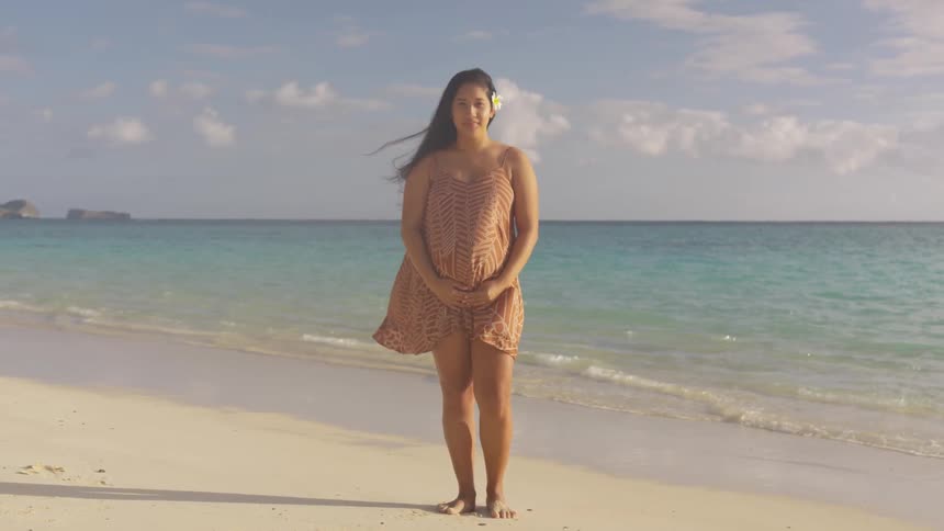 A woman holding her belly