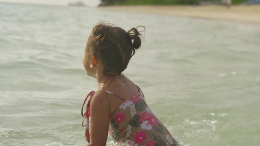 A girl playing in the water