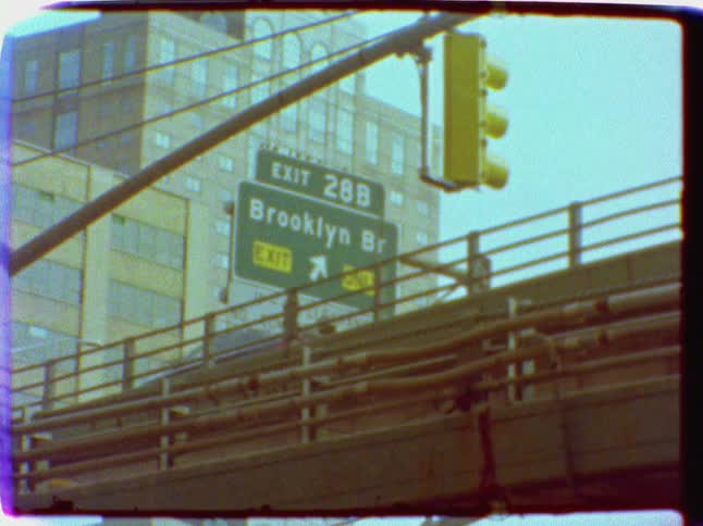 Cars driving near brooklyn bridge