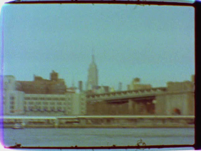 Cars drive in a city