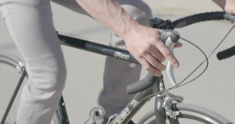 A man cycling on the road
