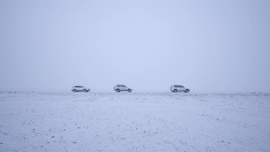 Cars parked in the snow