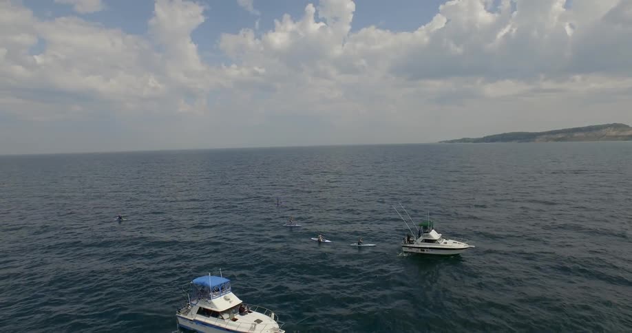 Boats and kayaks coming back into port