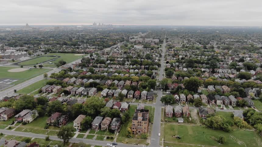 An aerial view of a neighborhood is displayed