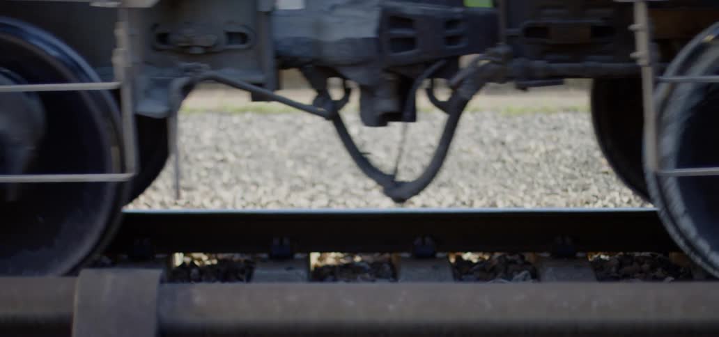 The wheels of a train on a track