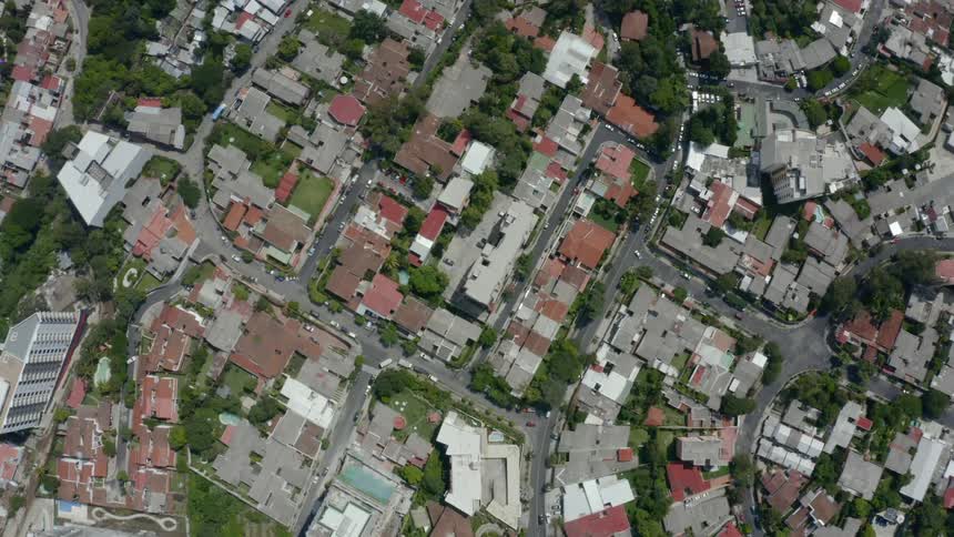 An aerial view looking down onto the residential suburbs of a city
