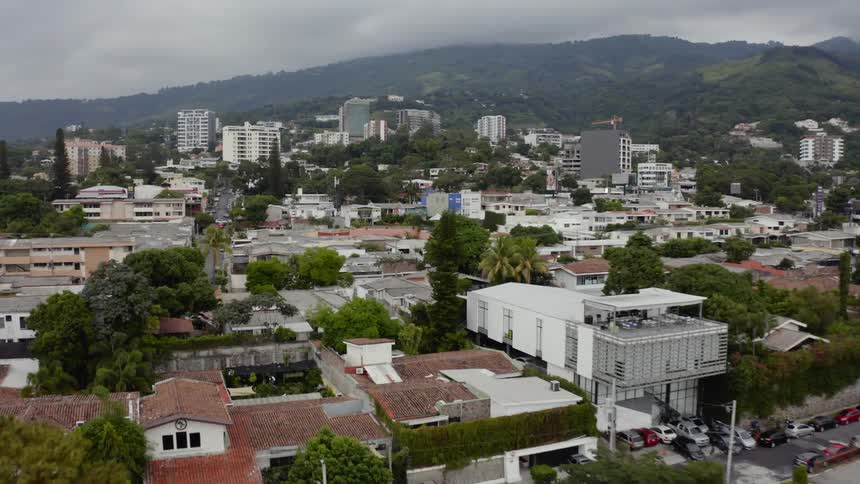 A neighborhood with many houses and hills