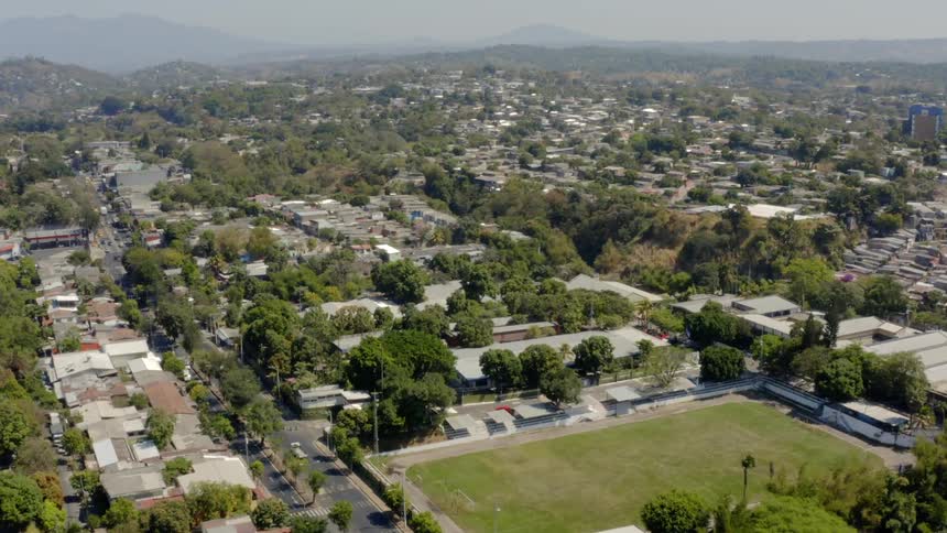 An aerial view of a neighborhood is displayed