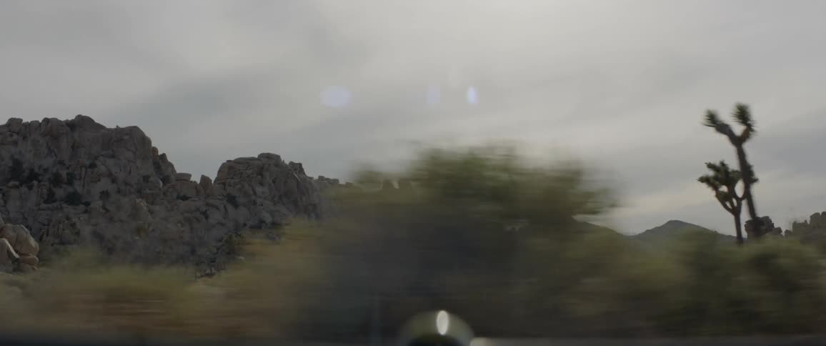 The desert is lined with a small wall of rocks