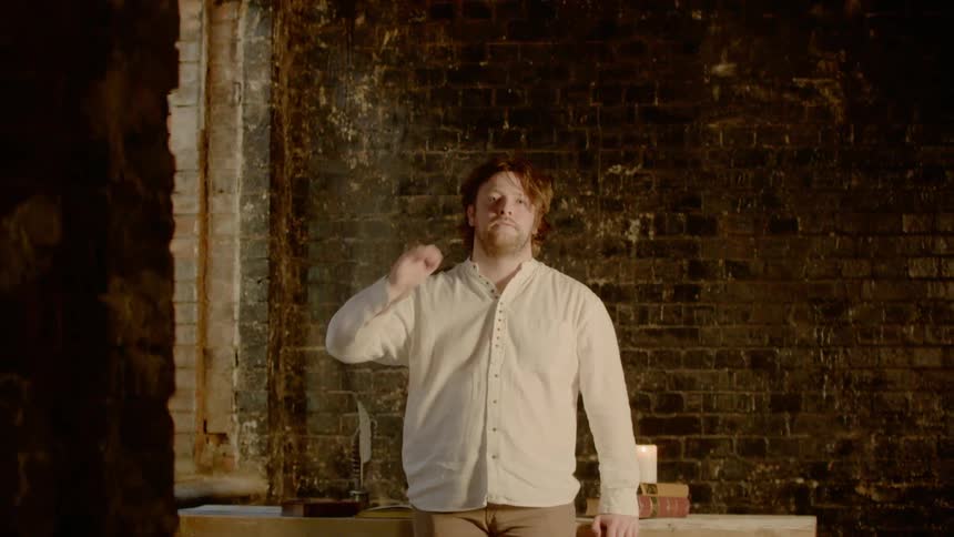 A man is standing in a room