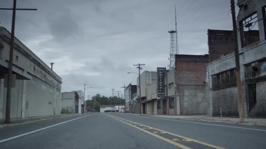 Old abandoned buildings under gray sky
