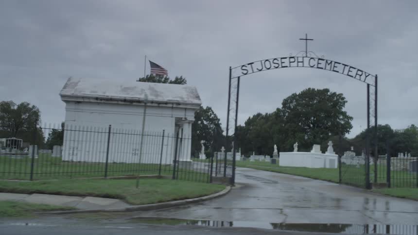 Driving past st. joseph cemetery on a cloudy day