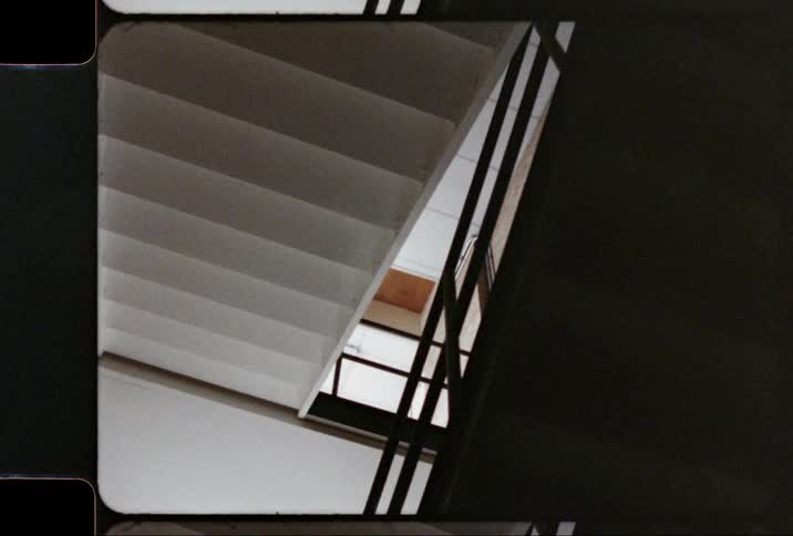 Looking up at the underside of steps in a stairwell