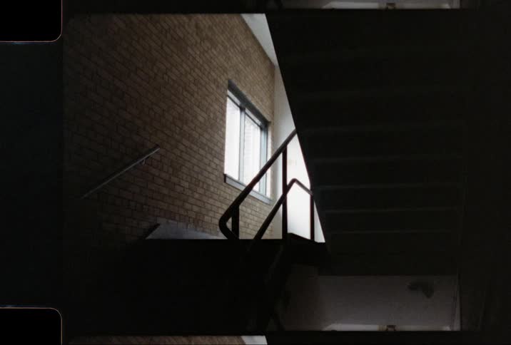 A staircase accessing three levels in a building