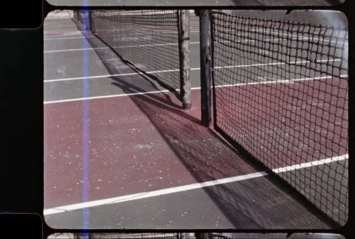 Nets stretch across several tennis courts