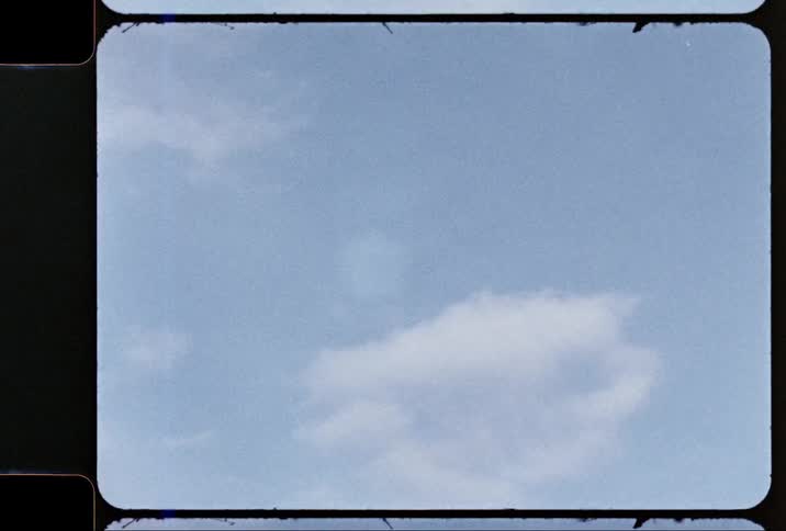 Clouds float in the blue sky during the day