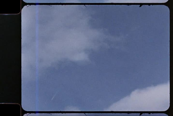 An airplane in the cloudy sky