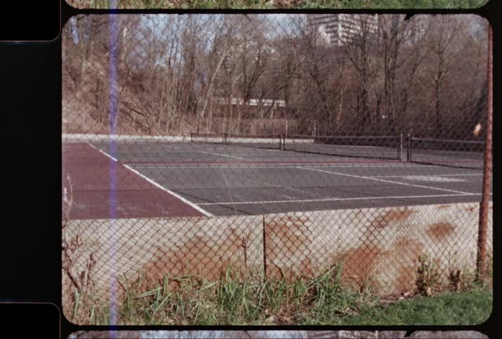 A fenced tennis court