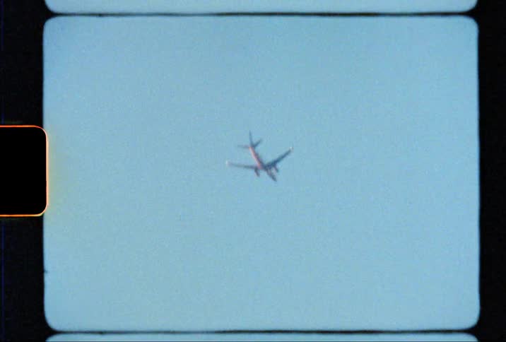 An airplane is moving in the sky