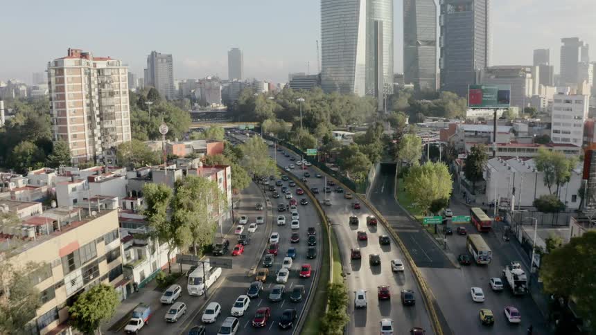 A city with roads buildings and vehicles
