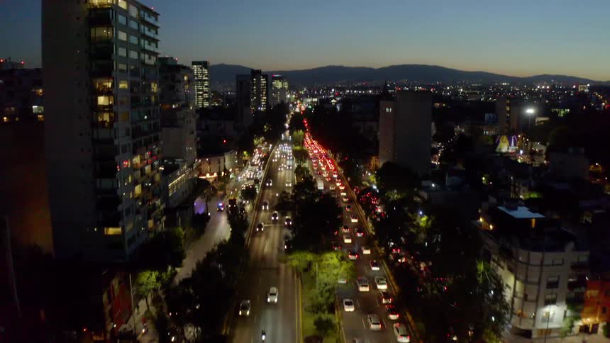 Cars traveling on city highways with one direction in bumper to bumper traffic