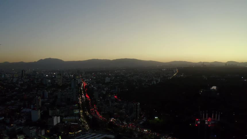 Aerial view of a city in the evening