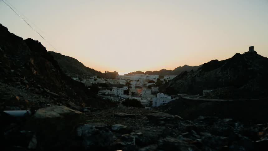 The sun is rising in the horizon