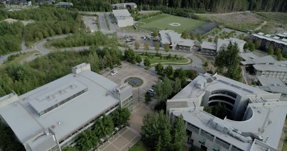 Buildings on campus surrounded by forest