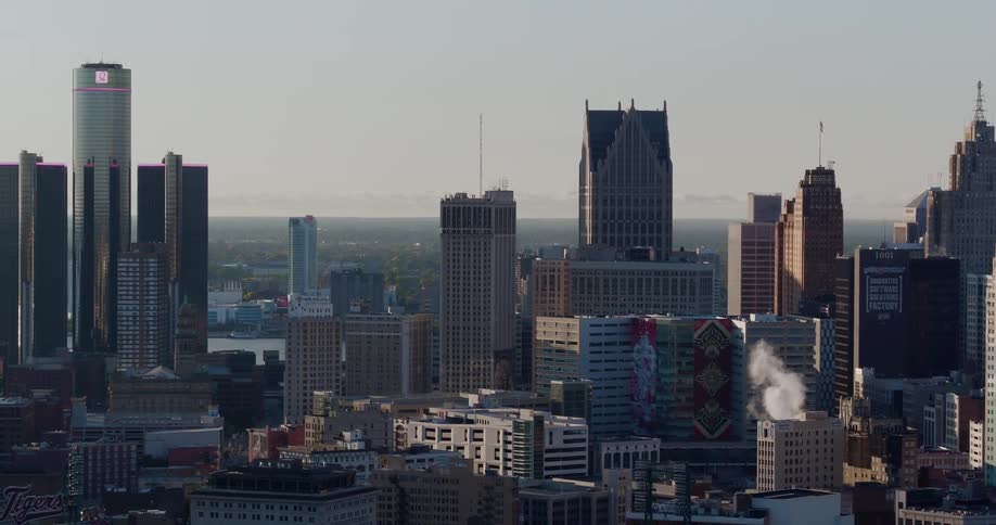 A downtown of a city next to a river