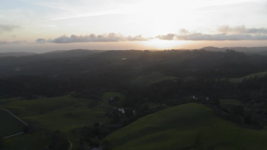 Winding roads through a hilly countryside